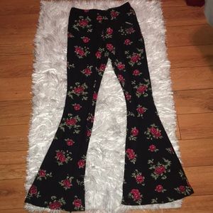 Black flare pants with red roses